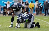 Russell Okung, who is recovering from shoulder surgery, received no guaranteed money in his new deal. (AP)