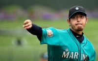 After a deal with the Dodgers fell through, Hisashi Iwakuma returned for his fifth season with the M's. (AP)