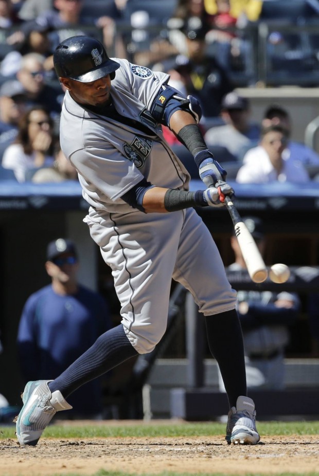 Seattle Mariners' Nelson Cruz hits an hits an RBI double during the fifth inning of a baseball game against the New York Yankees Saturday, April 16, 2016, in New York. (AP Photo/Frank Franklin II)