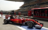Ferrari driver Kimi Raikkonen of Finland pulls onto the pit lane during the first practice session for the Chinese Formula One Grand Prix at the Shanghai International Circuit, in China, Friday, April 15, 2016.  (AP Photo/Mark Schiefelbein)