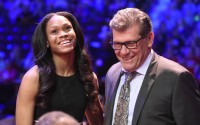 Connecticut's Moriah Jefferson smiles after being congratulated by UConn coach Geno Auriemma, right, after the San Antonio Stars selected Jefferson with the second pick in theWNBA basketball draft, Thursday, April 14, 2016, in Uncasville, Conn. (Cloe Poisson/Hartford Courant via AP) MANDATORY CREDIT