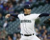 Seattle Mariners starting pitcher Hisashi Iwakuma throws against the Texas Rangers in the first inning of a baseball game, Monday, April 11, 2016, in Seattle. (AP Photo/Ted S. Warren)