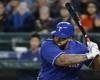 Texas Rangers' Prince Fielder begins his swing on a sacrifice fly that scored Nomar Mazara in the third inning of a baseball game, Monday, April 11, 2016, in Seattle. (AP Photo/Ted S. Warren)