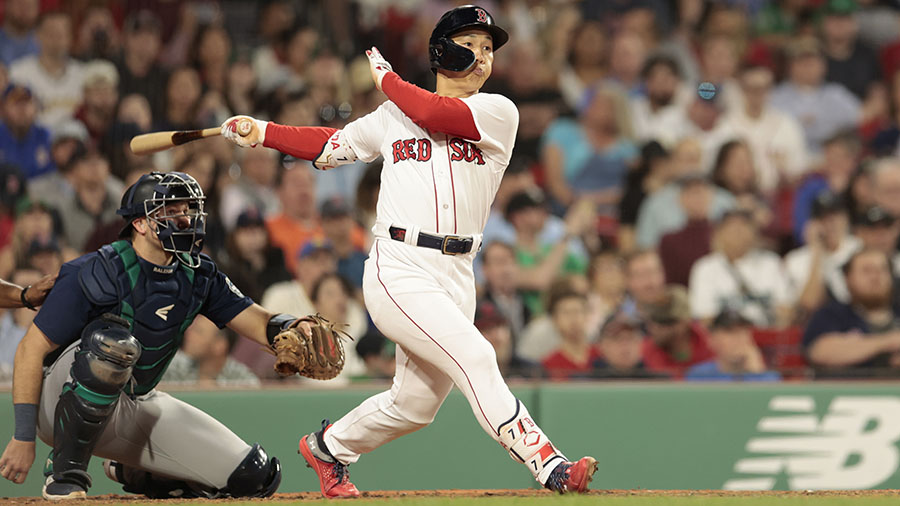 Masataka Yoshida of the Boston Red Sox walks back to the dugout