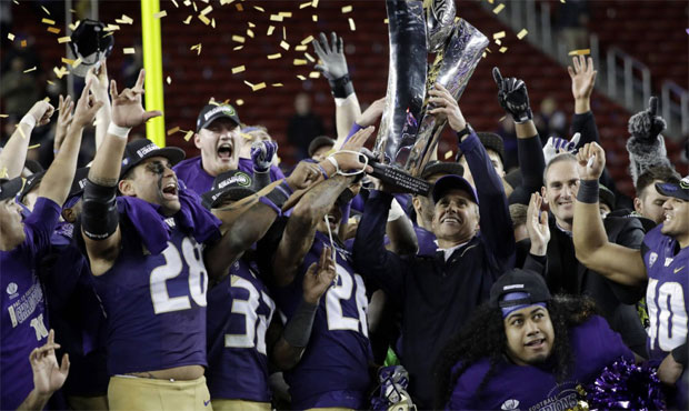 Chris Petersen has led the Huskies to the college football semifinals in his third season at Washin...