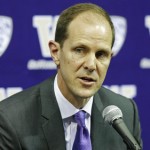 Mike Hopkins talks to reporters after he was introduced as Washington's new head NCAA college basketball coach, Wednesday, March 22, 2017, in Seattle. Hopkins, a longtime Syracuse assistant coach, replaces Lorenzo Romar. (AP Photo/Ted S. Warren)