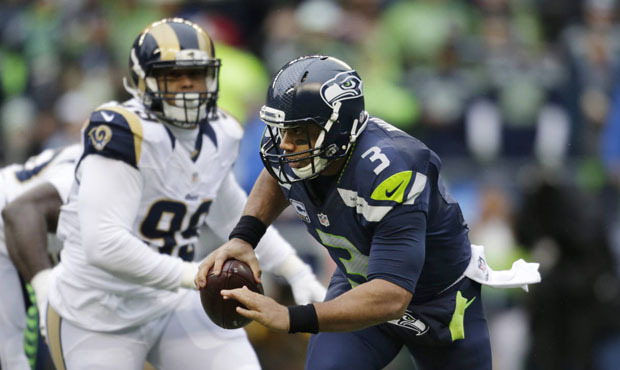 The Seahawks struggled vs. the Rams' front seven without their starting left tackle, tight end and tailback. (AP)