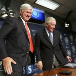 John Stanton, left, who would become the Seattle Mariners' chairman and chief executive officer, and current Chairman Howard Lincoln smile as they finish a news conference Wednesday, April 27, 2016, in Seattle. Nintendo of America plans to sell its controlling stake in the Mariners to a group of minority owners led by Stanton. Lincoln announced the intended transaction, along with his plan to retire from day-to-day oversight of the franchise. The ownership change is subject to approval by Major League Baseball, which the club hopes to get during league meetings in August. (AP Photo/Elaine Thompson)