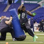 FILE - In this Feb. 28, 2016, file photo, Alabama defensive lineman Jarran Reed runs a drill at the NFL football scouting combine in Indianapolis. Two people familiar with the plans have told The Associated Press that Buffalo Bills officials are visiting Alabama on Friday, April 26, 2016, to meet with Crimson Tide defensive tackle Jarran Reed, a projected first-round draft pick. The people spoke on the condition of anonymity because the meeting, which will include dinner, has not been publicized.  (AP Photo/Michael Conroy, File)