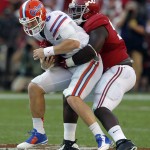 Florida quarterback Jeff Driskel (6) is sacked by Alabama defensive lineman Jarran Reed (90) for a loss during the second half of an NCAA college football game on Saturday, Sept. 20, 2014, in Tuscaloosa, Ala. (AP Photo/Butch Dill)