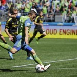 Seattle Sounders' Jordan Morris makes a shot on goal against the Columbus Crew in the second half of an MLS soccer match, Saturday, April 30, 2016, in Seattle. The Sounders beat the Crew 1-0. (AP Photo/Ted S. Warren)