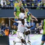 Seattle Sounders' Chad Marshall, top, and Osvaldo Alonso, right, vie for a header with Philadelphia Union's C.J. Sapong, center, and Warren Creavalle, bottom, during the first half of an MLS soccer match Saturday, April 16, 2016, in Seattle. (AP Photo/Ted S. Warren)
