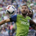 Seattle Sounders midfielder Clint Dempsey, front, and Philadelphia Union defender Warren Creavalle eye the ball during the first half of an MLS soccer match Saturday, April 16, 2016, in Seattle. (AP Photo/Ted S. Warren)