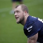 Seattle Seahawks' Justin Britt stretches during drills at an NFL football practice Thursday, May 26, 2016, in Renton, Wash. (AP Photo/Elaine Thompson)