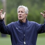 Seattle Seahawks head coach Pete Carroll motions at an NFL football practice Thursday, May 26, 2016, in Renton, Wash. (AP Photo/Elaine Thompson)
