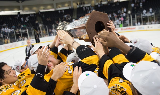The Wheat Kings celebrate with the Ed Chynoweth cup after defeating the T-Birds 8-4 in Game 5. (T-B...