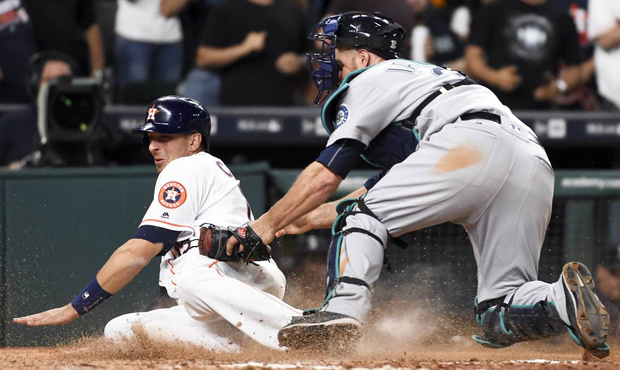 Chris Iannetta applied the tag to prevent the Astros' Jason Castro from scoring a big run on Thursd...