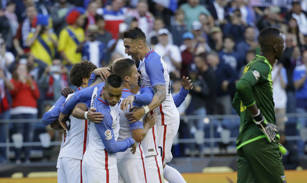 United States' players celebrate after Gyasi Zardes scored against Ecuador in its 2-1 win Thursday....