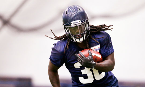 Running back Alex Collins is among the rookies who will be vying for significant roles during train...