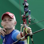 
              Mackenzie Brown of the United States releases her arrow during an elimination round of the individual archery competition at the Sambadrome venue during the 2016 Summer Olympics in Rio de Janeiro, Brazil, Monday, Aug. 8, 2016. (AP Photo/Alessandra Tarantino)
            