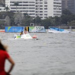 
              A distance marker is blown off its frame after rowing competitions were cancelled for the day in Lagoa due to high winds and rough waters at the 2016 Summer Olympics in Rio de Janeiro, Brazil, Sunday, Aug. 7, 2016. (AP Photo/David Goldman)
            