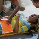 
              Melissa Hoskins of the Australian women's track cycling team is tended to after crashing during a training session inside the Rio Olympic Velodrome during the 2016 Olympic Games in Rio de Janeiro, Brazil, Monday, Aug. 8, 2016. (AP Photo/Pavel Golovkin)
            