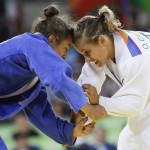 
              Italy's Odette Giuffrida competes against Kosovo's Majlinda Kelmendi during the finals the women's 52-kg judo competition at the 2016 Summer Olympics in Rio de Janeiro, Brazil, Sunday, Aug. 7, 2016. (AP Photo/Markus Schreiber)
            