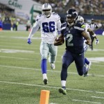 Seattle Seahawks quarterback Trevone Boykin (2) runs for a touchdown in the second half of a preseason NFL football game against the Dallas Cowboys, Thursday, Aug. 25, 2016, in Seattle. (AP Photo/Stephen Brashear)