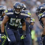 Seattle Seahawks outside linebacker K.J. Wright (50) reacts to a play against the Minnesota Vikings during the first half of a preseason NFL football game, Thursday, Aug. 18, 2016, in Seattle. (AP Photo/John Froschauer)