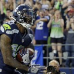 Seattle Seahawks wide receiver Paul Richardson celebrates after scoring a touchdown against the Dallas Cowboys in the first half of a preseason NFL football game, Thursday, Aug. 25, 2016, in Seattle. (AP Photo/Elaine Thompson)