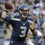 Seattle Seahawks quarterback Russell Wilson passes against the Dallas Cowboys during the first half of a preseason NFL football game, Thursday, Aug. 25, 2016, in Seattle. (AP Photo/Elaine Thompson)