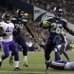 Seattle Seahawks running back Troymaine Pope (26) scores a touchdown against the Minnesota Vikings during the second half of a preseason NFL football game Thursday, Aug. 18, 2016, in Seattle. (AP Photo/John Froschauer)