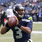 Seattle Seahawks QB Russell Wilson #3  in action, before the game against the Oakland Raiders at CenturyLink Field during an NFL game in Seattle on Sunday, Nov. 2, 2014. (AP Photo/David Seelig)