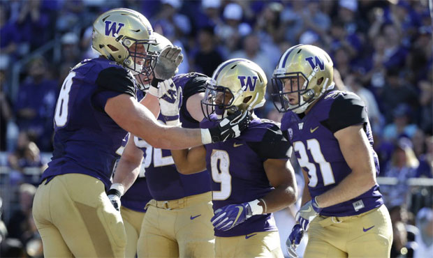 Myles Gaskin carried 12 times for 67 yards and a touchdown in the Huskies' win over Idaho. (AP)...