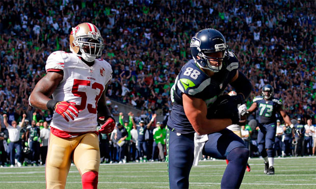Jimmy Graham had six catches for 100 yards Sunday and scored his first touchdown since his knee inj...