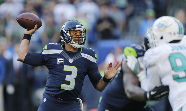 With an sprained ankle limiting his mobility, Russell Wilson needs all the time to operate he can g...