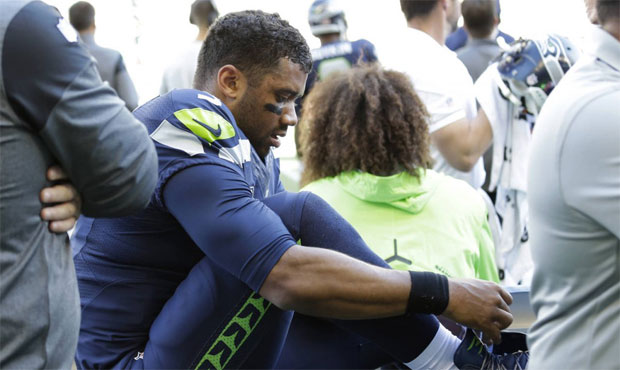 Pete Carroll sounded confident that Russell Wilson will play next week despite a sprained ankle. (A...