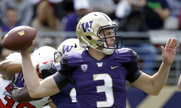 Six of Jake Browning's first eight passes against Rutgers were completed, and three went for touchd...