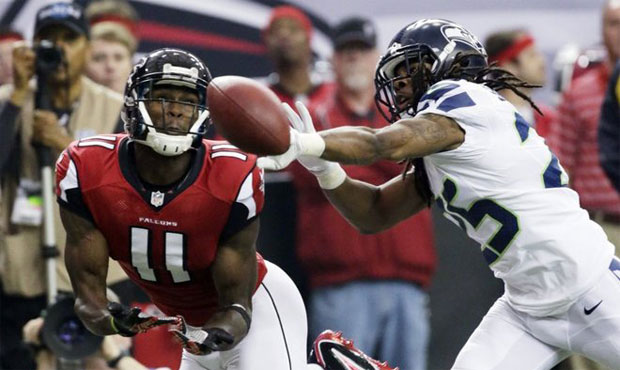 Richard Sherman and Julio Jones, pictured in a 2012 playoff game, could see plenty of each other Su...