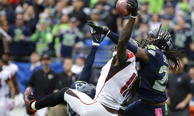 Richard Sherman avoided a pass-interference penalty on the Falcons' final attempt Sunday. (AP)...