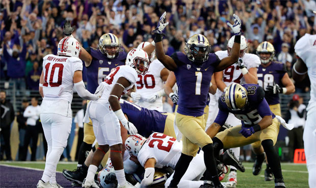 The 8-0 Huskies are fifth in the first College Football Playoff rankings, one spot behind 7-1 Texas...