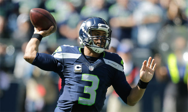 Russell Wilson's passing stats: 66.8 percent, 2,442 yards, 10 touchdowns, two interceptions, 99.4 r...
