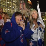 
              Chicago Cubs fans Pam Noie, left, and Janet Wham react during a watch party, after Game 7 of the baseball World Series between the Cleveland Indians and the Cubs, outside Progressive Field, early Thursday, Nov. 3, 2016, in Cleveland. The Cubs won 8-7 to win the series. (AP Photo/David Dermer)
            