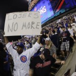 
              Fan react after the Chicago Cubs won Game 7 of the Major League Baseball World Series against the Cleveland Indians Thursday, Nov. 3, 2016, in Cleveland. The Cubs won 8-7 in 10 innings to win the series 4-3. (AP Photo/Charlie Riedel)
            