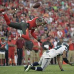 Seattle Seahawks wide receiver Doug Baldwin (89) loses the football as he is hit by Tampa Bay Buccaneers free safety Bradley McDougald (30) during the second quarter of an NFL football game Sunday, Nov. 27, 2016, in Tampa, Fla. McDougald was called for a pass interference penalty. (AP Photo/Phelan Ebenhack)