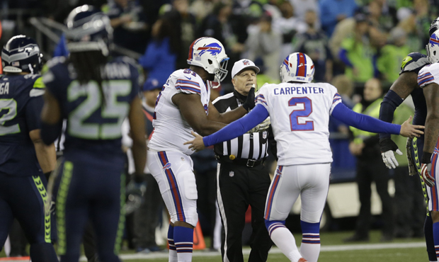 The NFL said Richard Sherman should have been flagged for unnecessary roughness on Dan Carpenter. (...