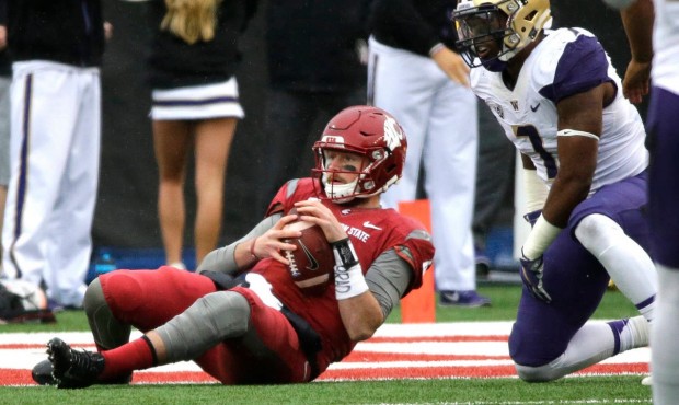Luke Falk threw three interceptions for just the second time in his WSU career on Friday. (AP)...
