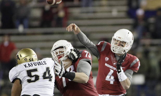 Luke Falk is the Pac-12's leading passer, but Colorado is allowing only 17.9 points a game. (AP)...
