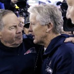 New England Patriots head coach Bill Belichick, left, and Seattle Seahawks head coach Pete Carroll speak at midfield after an NFL football game, Sunday, Nov. 13, 2016, in Foxborough, Mass. The Seahawks won 31-24. (AP Photo/Charles Krupa)