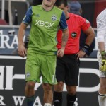 Seattle Sounders forward Jordan Morris hobbles to the bench for medical help after being slightly injured while scoring a goal against the Colorado Rapids in the second half of the second leg of an MLS Western Conference soccer finals game Sunday, Nov. 27, 2016, in Commerce City, Colo. Seattle won 1-0 to advance to the MLS championship game. Morris remained in the game. (AP Photo/David Zalubowski)